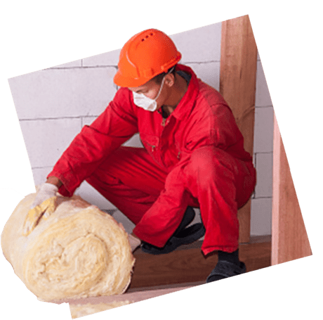 Person unravelling insulation roll