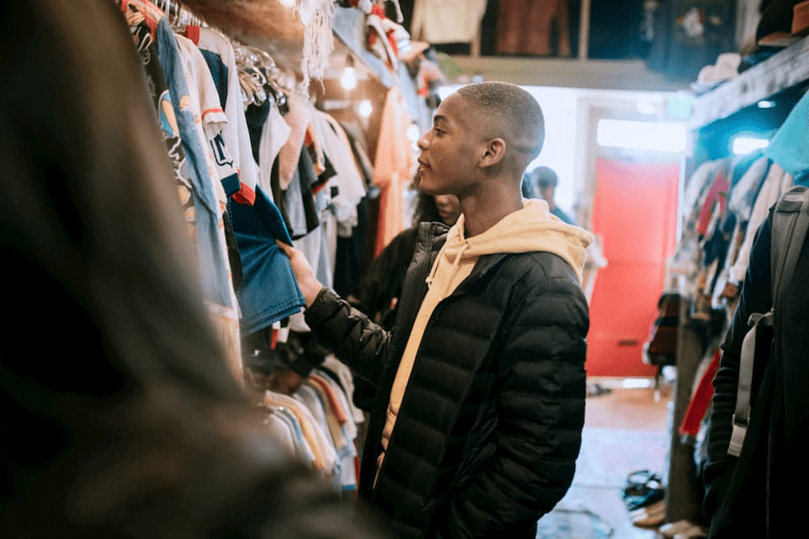 A man shops for clothes second-hand