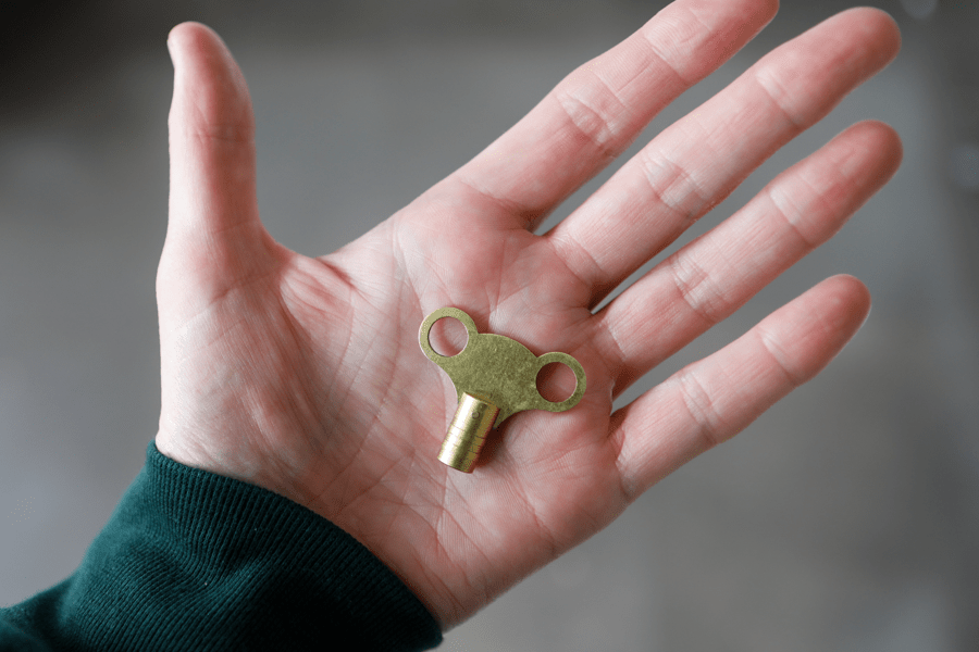 radiator key in hand