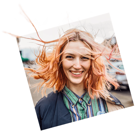 smiling lady with wind in her hair