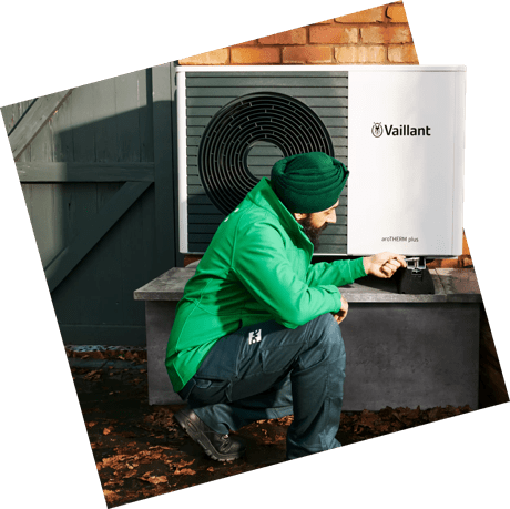 Engineer checking heat pump