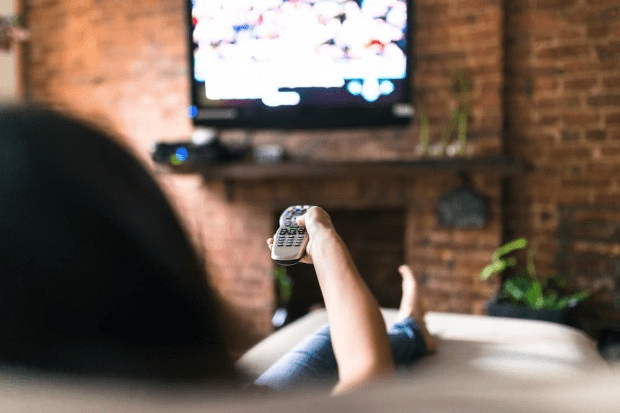 Vampire power: a person watching TV at home