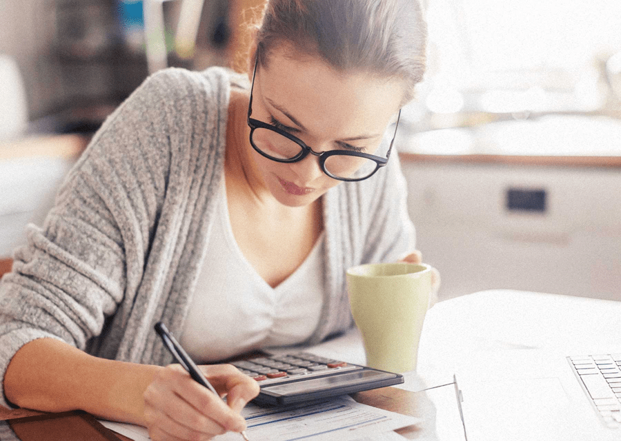 Woman calculating her energy bills