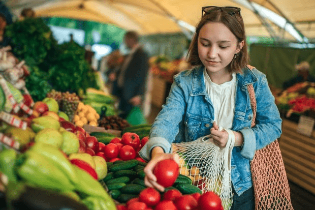 Woman shopping for fruit and vegetables