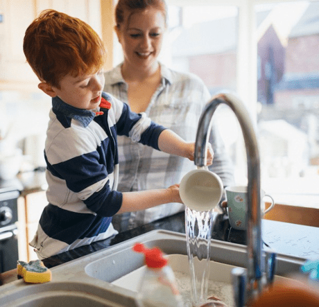 boy washing dishes