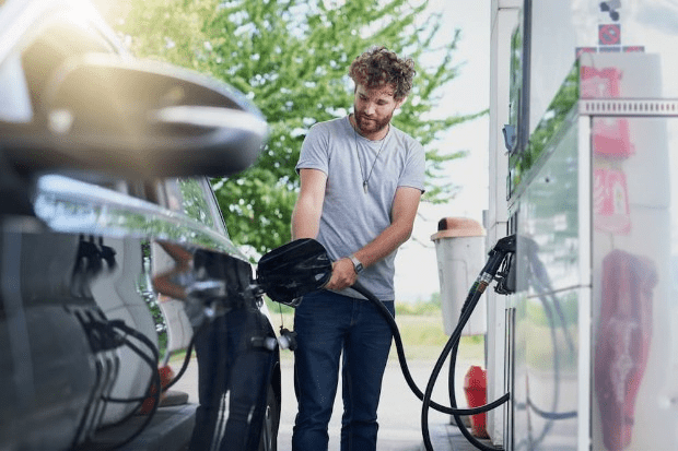 A man filling his car with petrol