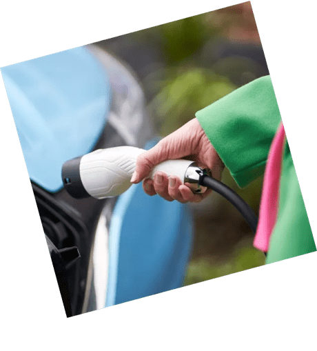 Woman holding a car charger