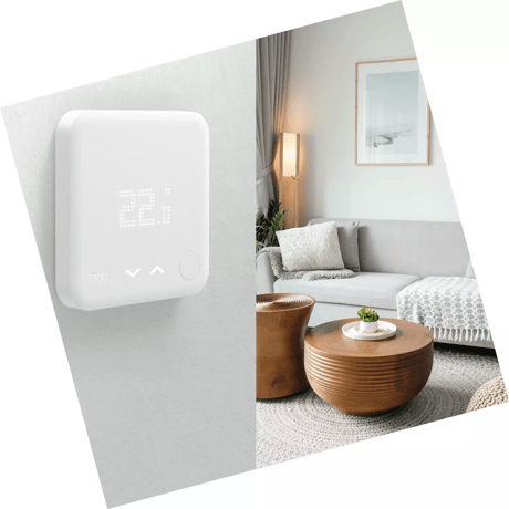 tado smart thermostat on wall of home