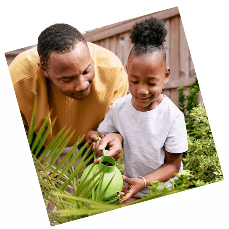 Father and daughter gardening