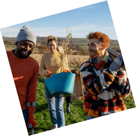 Adults gardening in a field