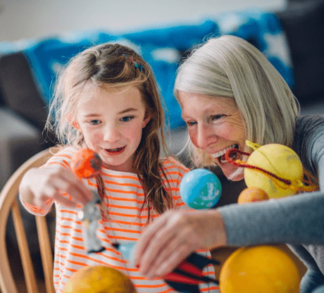 granny playing with her granddaughter