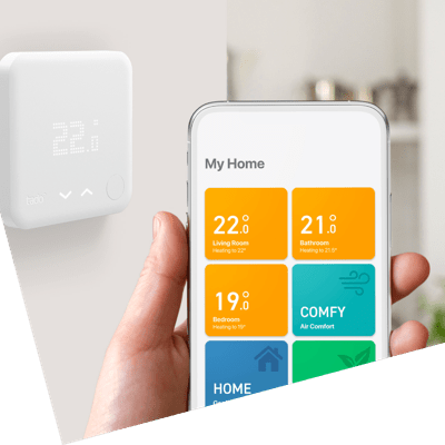 Someone using the tadoº app to manage their tadoº smart thermometer in their home