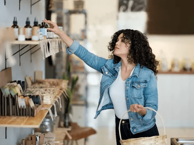 A woman shops for zero-waste products