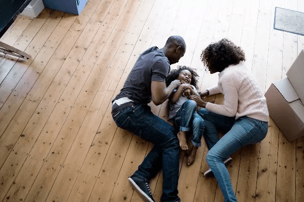 family playing on the floor