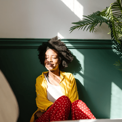 Woman sitting in the sun