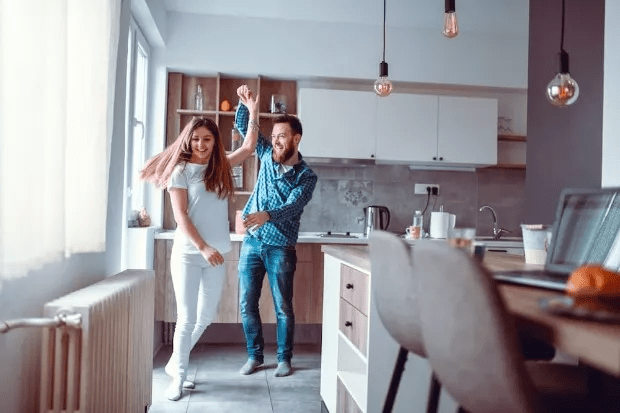 Couple dancing in the kitchen