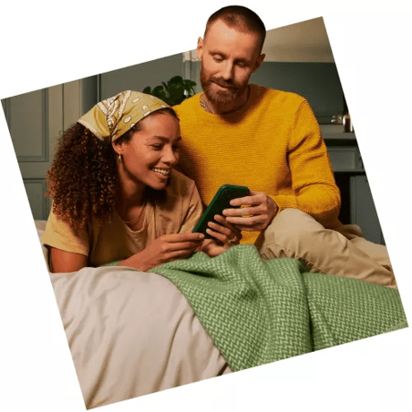 Couple looking at phone