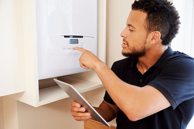 Engineer inspecting a boiler