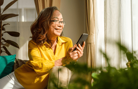 OVO customer reading energy tips on her mobile